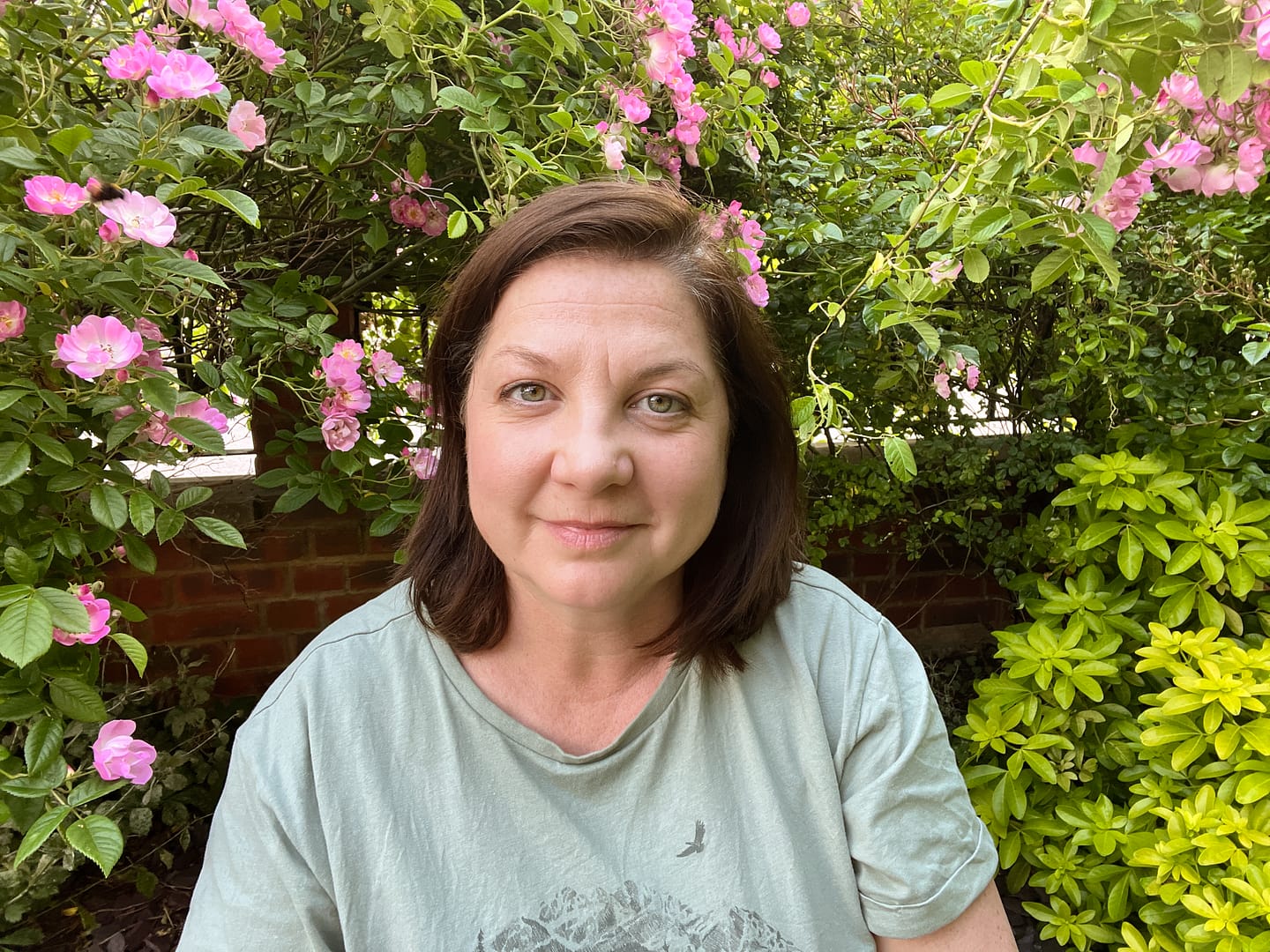 me in front garden with roses scaled