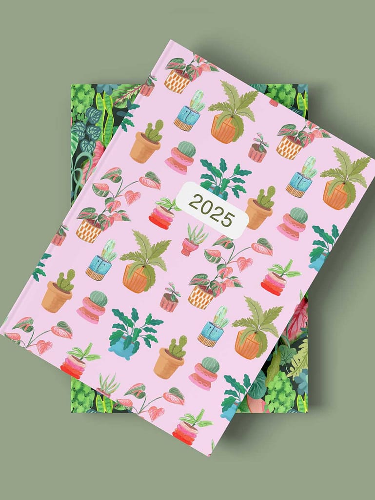 notebooks with pattern cover featuring potted plants
